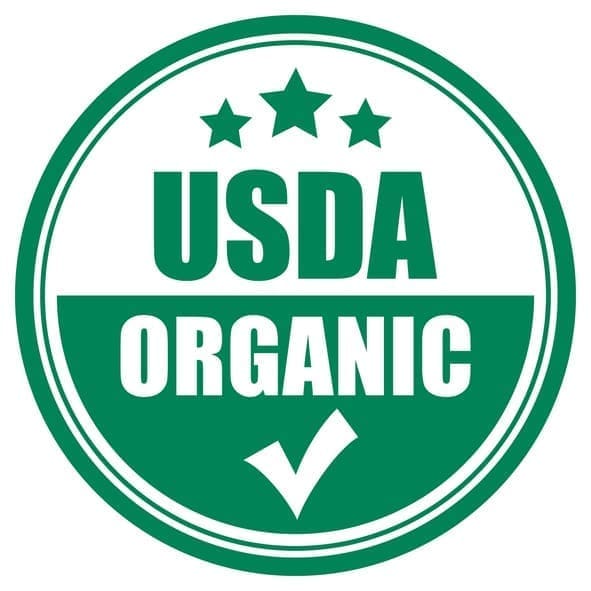 Green and white circular USDA Organic seal with three stars at the top, bold USDA ORGANIC text in the center, and a checkmark at the bottom, indicating organic certification.